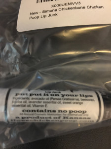Image of Chicken Poop Lip Balm assuring us all it contains no poop. which it doesn't.